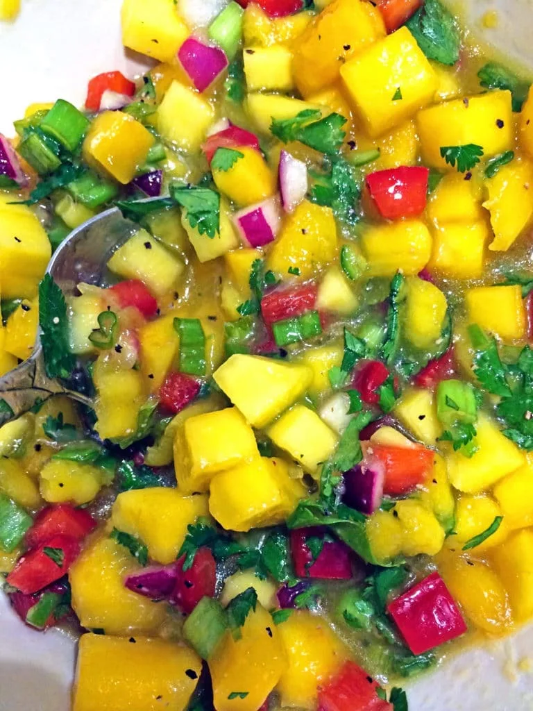 Swordfish steaks marinating in lime and cumin marinade before grilling